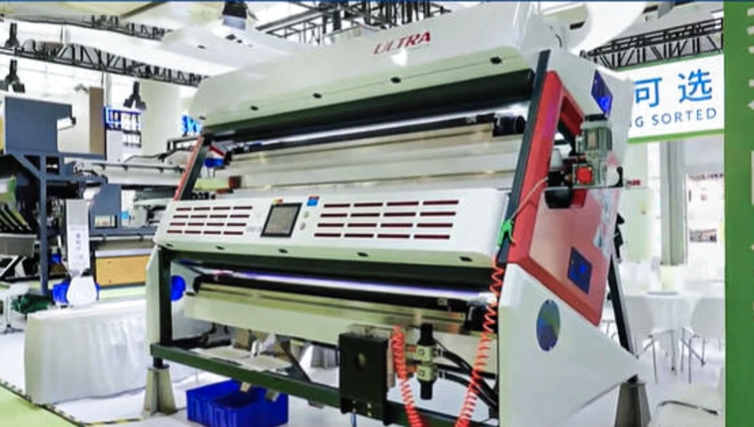 APEX intelligent optical sorting machine displayed at Xiamen Stone Fair for quartz and non-metallic ore processing
