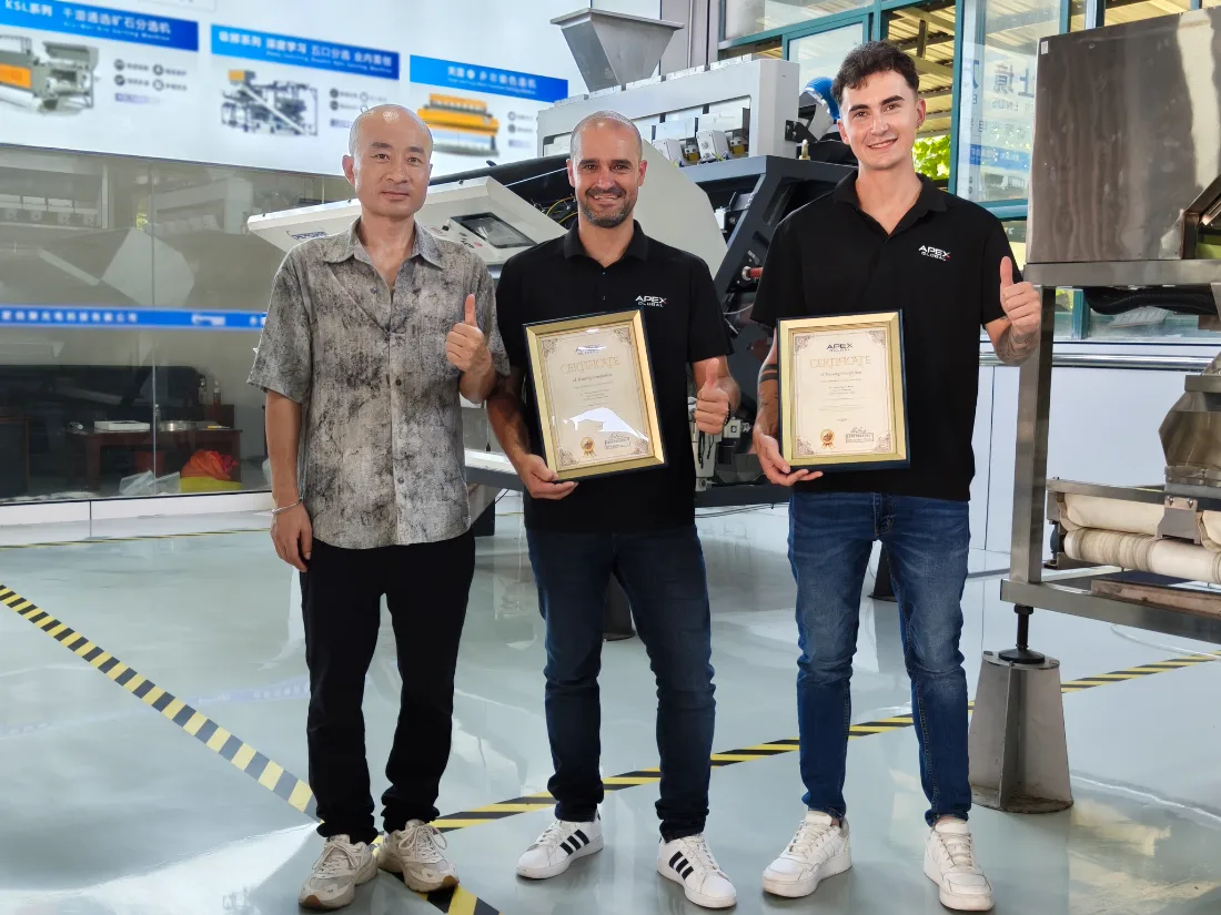 Spanish partner poses with official completion certificates after he is awarded with official training certificate upon passing comprehensive APEX technical training assessment